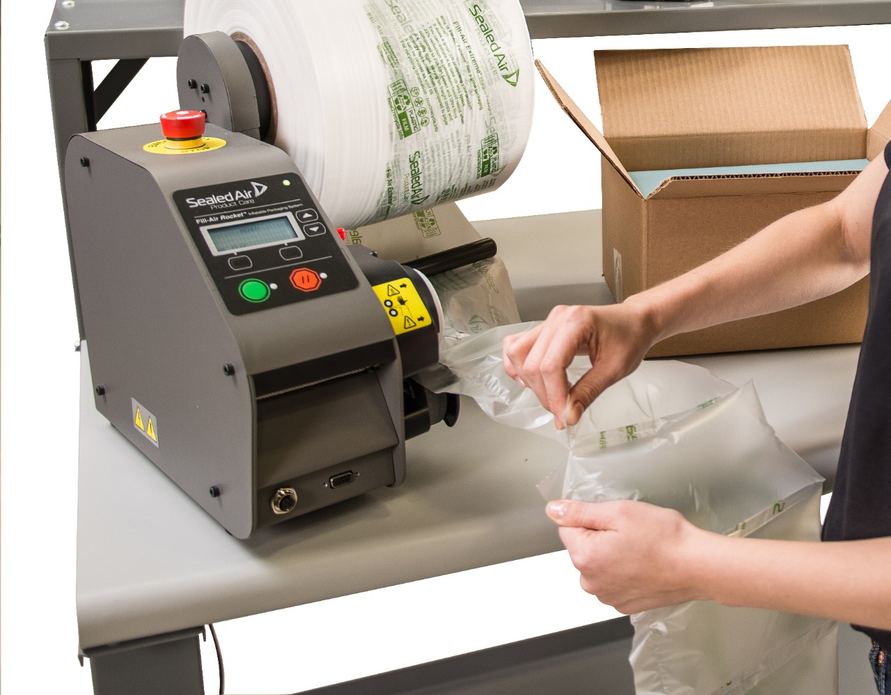 woman using BUBBLE WRAP brand Rocket inflator system